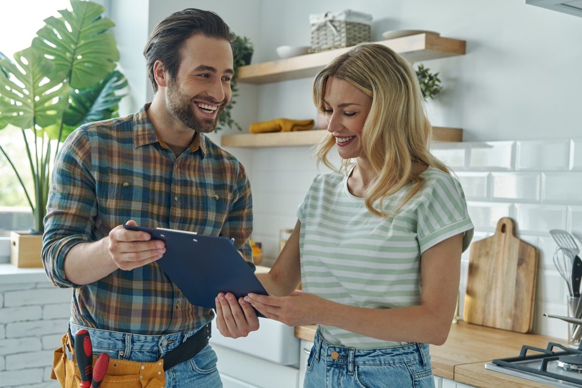 A service professional going over a quote with a homeowner